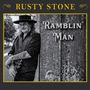 Text: "RUSTY STONE" oben, "RAMBLIN 'MAN" rechts. Schwarz-weißes Foto eines Mannes mit Gitarre an einem Baum., LP