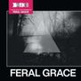 Text: "FERAL GRACE" und "THE BLACK DOG PRESENTS". Schwarz-weißes Bild von Bäumen mit einem transparenten Dreieck., CD