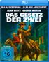 "Das Gesetz der Zwei" Blu-ray-Cover: Zwei Cowboys reiten auf Pferden im Western-Stil vor einem Gebäude bei Nacht.