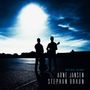 "GOING HOME ARNE JANSEN STEPHAN BRAUN" zeigt zwei Gitarristen-Silhouetten vor hellem Himmel., CD