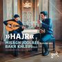 "Hajr" Misagh Joolaee Kamancheh, Bakr Khleifi Oud. Aufgenommen im Pierre Boulez Saal, Berlin. Zwei Musiker im eleganten Raum.