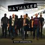 "Haymaker: Skinhead Rock 'n' Roll. Good Intentions." Eine Gruppe von Männern in dunkler Kleidung in einem Tunnel., LP