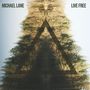Oben steht "MICHAEL LANE" und "LIVE FREE". In der Mitte ein gespiegelter Baum mit einem durchsichtigen Dreieck darüber.