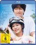 Text: "Hong Kyung", "Roh Yoon Seo", "Kim Min Ju", "Hear me Our Summer", "FSK ab 6 freigegeben".  
Zwei lächelnde Personen, Helm, Roller.