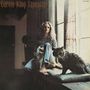 Text: "Carole King Tapestry". Frau sitzt entspannt neben einem großen Fenster, eine Katze sitzt daneben., LP
