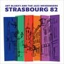 Text: "Art Blakey and the Jazz Messengers Strasbourg 82." Bunte Illustration von Straßenszene mit Skizzenstil., CD