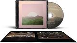 CD-Hülle mit Text: "to the sun and all the cities in between", "CITY OF THE SUN". Cover zeigt Berge und einen Sonnenuntergang.