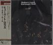 Text: „Hubert Laws Carnegie Hall“. Japanische Schriftzeichen auf der linken Seite. Schwarzer Hintergrund mit Musikern.