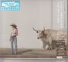 Die Textelemente sind „NEW MUSIC FRIDAYS“ und japanische Schriftzeichen. Links steht eine Frau im Cowgirl-Look neben einem Stier., CD