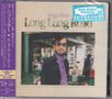 Texte: „Ringo Starr Long Long Road“ und viele japanische Schriftzeichen. Ein Mann mit Sonnenbrille steht in einem bunten Raum., CD