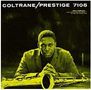 Text: "COLTRANE/PRESTIGE 7105", "John Coltrane". Ein Mann sitzt ernst, ein Saxophon liegt vor ihm. Alles in gelblich-grünen Tönen.