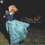 „Diana Krall, When I look in your eyes“. Eine Frau in einem blauen Kleid tanzt lachend auf einer Wiese., CD