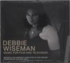 „DEBBIE WISEMAN MUSIC FOR FILM AND TELEVISION.“ Darunter eine Frau in Schwarz-Weiß, mit Schmuck, formell gekleidet., CD