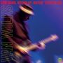 "LOW DOWN, WOUND UP, ROCKIN' TEXAS BLUES" in Rot, "VAN WILKS" in Grün, unscharfer Gitarrist in Bewegung, lila Hintergrund., LP