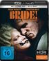 Text: „JESSIE BUCKLEY“, „CHRISTIAN BALE“, „HERE COMES THE MOTHER F*%#ING BRIDE!“, „ES LEBE DIE BRAUT“. Nahaufnahme zweier Gesichter.