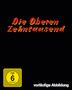 Text „Die Oberen Zehntausend“ in Rot-Gelb. Unten links „FSK ab 6 freigegeben“. Unten rechts „vorläufige Abbildung“., 1 Ultra HD Blu-ray und 1 Blu-ray Disc