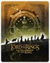 "THE LORD OF THE RINGS: THE FELLOWSHIP OF THE RING" in goldener Schrift, mit Silhouetten von 9 Figuren in einer Szene.