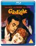 "Gaslight" mit Charles Boyer, Ingrid Bergman, Joseph Cotten. Drei ernste Gesichter. Goldenes und violettes Farbschema.