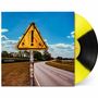 Texte: "James Marriott", "Warning Signs". Gelbes Warnschild mit Ausrufezeichen an einer Landstraße, blauer Himmel., LP