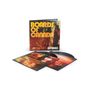„Boards of Canada“ und „Inferno“ auf einem CD-Cover. Die Hülle zeigt unscharfe, rötliche Bilder. CDs liegen darum., 2 LPs