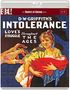 Texte: "INTOLERANCE", "LOVE'S STRUGGLE Throughout THE AGES". Illustration: Frau in gelbem Kleid hält ein Baby, Hände greifen danach., Blu-ray Disc