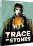 "TRACE of STONES" in großer Schrift, darüber ein Frauenporträt und zwei Männergesichter in einer urbanen Umgebung.