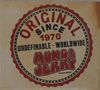 "Original since 1970, Undefinable Worldwide, Mungo Jerry." Ein rundes Logo mit rotem Rand auf beigem Hintergrund., CD