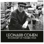 Text: "LEONARD COHEN IN CONCERT AT THE BBC 1968." Ein Mann in einem Café, trägt Mantel und Mütze, neben ihm ein Glas., LP