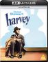 James Stewart; harvey. Ein Mann in Anzug und Hut sitzt lächelnd neben einem Schatten in Hasenform., Ultra HD Blu-ray
