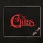 "The Cribs" in roter Schrift mit Rosenskizze, schräge Aufschrift "Selling A Vibe" unten rechts, schwarzer Hintergrund.