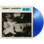 Aufschrift: "Sonny Landreth Bound By The Blues". Schwarz-weiß Foto: Person spielt Gitarre. Blaue Vinyl-Schallplatte., LP