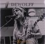 "DEWOLFF live on 2 meter sessions." Ein Musiker mit langen Haaren singt leidenschaftlich in ein Mikrofon und spielt Gitarre., LP