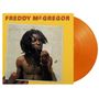 Text: "FREDDY MᶜGREGOR". Ein Mann mit Dreadlocks hält ein kleines Blatt Papier, daneben eine orangefarbene Schallplatte., LP