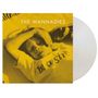 Text: "THE WANNADIES" und "be a girl". Gelbes Bild eines entspannten Kindes mit hochgelegtem Arm. Vinyl-Schallplatte sichtbar.