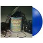Text: "Chicken Shack In the Can" und Namen von Musikern. Eine geöffnete Dose mit herausquellenden Tonbändern. Blaue Vinyl-Schallplatte., LP