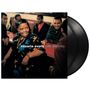 "cesaria evora café atlantico"; eine Frau in bunter Kleidung lacht mit mehreren Personen an einem Tisch. Vinyl im Hintergrund., 2 LPs