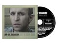 Cover und CD von Jay-Jay Johanson mit "BEST OF 1996-2026". Ein Gesicht mit ernstem Ausdruck ist abgebildet., CD