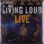 "Living Loud Live" steht in großen Buchstaben. Darunter ist eine Bühne mit Musikern erkennbar.