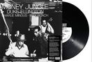 Titel "MONEY JUNGLE" mit Duke Ellington, Charlie Mingus, Max Roach. Schwarz-weißes Foto mit Schallplatte.