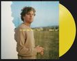 Text: "IN OUR OWN SWEET TIME VANCE JOY." Ein Mann blickt in der Landschaft zur Seite. Gelbe Schallplatte., LP
