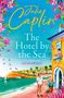 "Julie Caplin: The Hotel by the Sea" - Rezension von Sue Moorcroft. Illustration zeigt Küstenlandschaft mit Hotel, Mann und Blumen., Buch