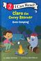 "Clara the Cucuy Rescuer Goes Camping" steht in gelber und weißer Schrift. Illustration: Mädchen und Monster am Lagerfeuer.