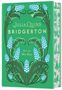 „Julia Quinn, Bridgerton, It's in His Kiss“ auf grünem Einband mit blauen Blumen-Illustrationen und Ranken., Buch