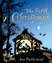 "The First Christmas" und "Jan Piéńkowski" in Gold auf blauem Hintergrund, gestaltet als Scherenschnitt mit Krippe und Tieren., Buch