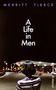 Texte: "MERRITT TIERCE", "A Life in Men", "A Memoir". Eine Person von hinten vor beleuchteter Tankstelle.