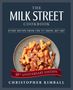 Text: "The Milk Street Cookbook. The definitive guide to the new home cooking, with every recipe from the TV show, 2017-2027. Cover to come. Christopher Kimball." Schwarzer Hintergrund.