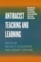 Titel: "Antiracist Teaching and Learning". Herausgeber: Nicole P. Dyszlewski, Dermot Groome. Farbverlauf: Orange zu Blau.