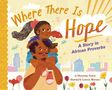 „Where There Is Hope: A Story in African Proverbs.“ Ein Mann trägt ein Kind auf den Schultern, umgeben von Blumen., Buch
