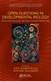 "Open Questions in Developmental Biology" behandelt molekulare, zelluläre und evolutionäre Perspektiven. Bunte Kreise und Zellen., Buch