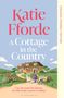 "Dyslexia-Friendly Edition", "Katie Fforde", "A Cottage in the Country", "Can she make her dreams of a life in the country a reality?" Illustration einer Frau mit Hund vor einem Landhaus., Buch